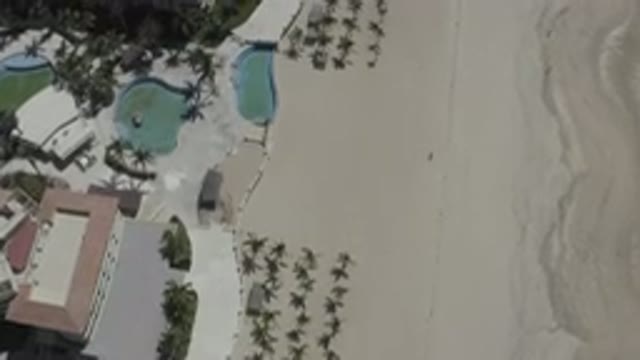 SAN JOSE DEL CABO MEXICO-2020: Top View Of A Wide Sandy Beach And Huge Buildings