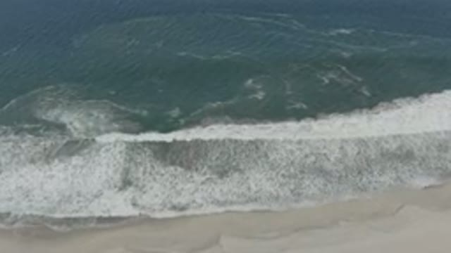 SAN JOSE DEL CABO MEXICO-2020: Blue Water With White Wave Crashing Into The Sand