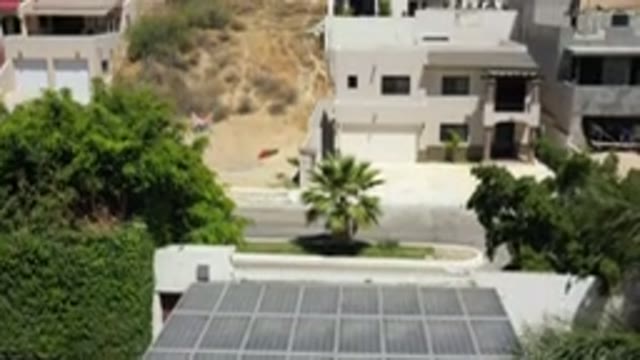 SAN JOSE DEL CABO MEXICO-2020: Drone Shot Of Building With Solar Panels On The Roof