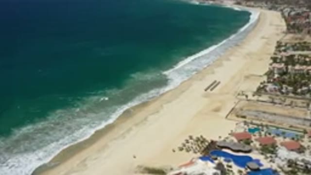 SAN JOSE DEL CABO MEXICO-2020: Top Side View Of A Long Sand Beach And Buildings