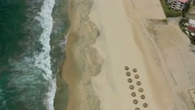 SAN JOSE DEL CABO MEXICO-2020: Beach Scene With Waves Coming In And Beach-Front