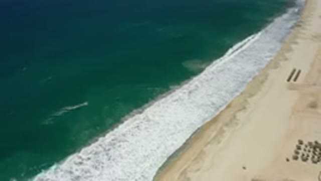 SAN JOSE DEL CABO MEXICO-2020: Gorgeous Deeply Navy Blue Waters With Calm Waves