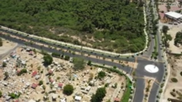 SAN JOSE DEL CABO MEXICO-2020: Drone Shot Of A Road Next To A Forest Of Trees