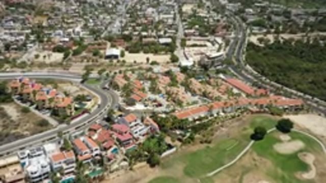 SAN JOSE DEL CABO MEXICO-2020: Aerial View Of Houses From The Sky Next To A Sandy Golf Course