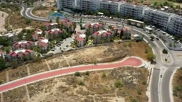 SAN JOSE DEL CABO MEXICO-2020: Moving Aerial View Over A City With Large Buildings