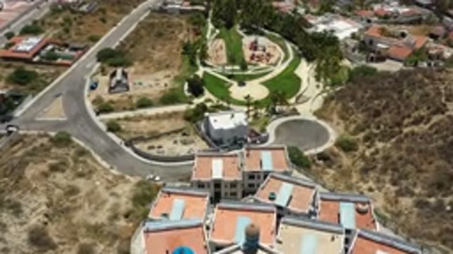 SAN JOSE DEL CABO MEXICO-2020: Sandy Green Next To Houses