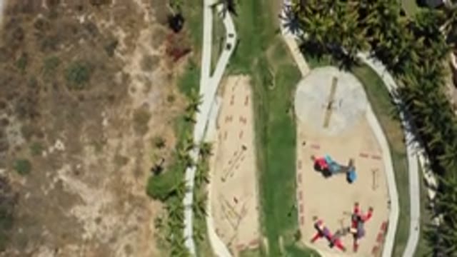 SAN JOSE DEL CABO MEXICO-2020: A Playground Area With Trees And Grass And Dirt
