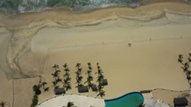 SAN JOSE DEL CABO MEXICO-2020: Aerial Shot Of Transition From Beachhouse To The Shore