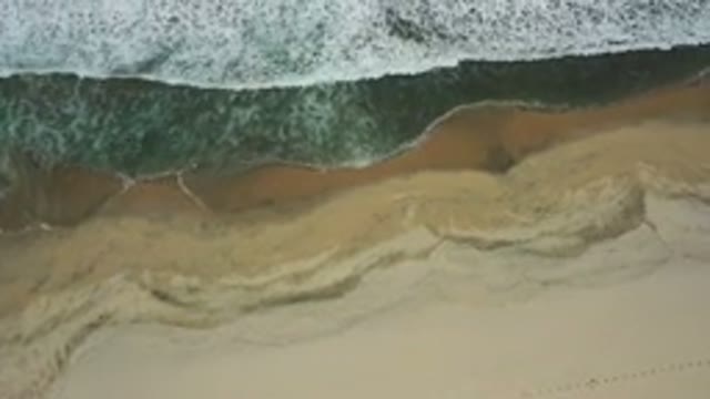SAN JOSE DEL CABO MEXICO-2020: Sandy Beach Line With Water Ebbing And Flowing On