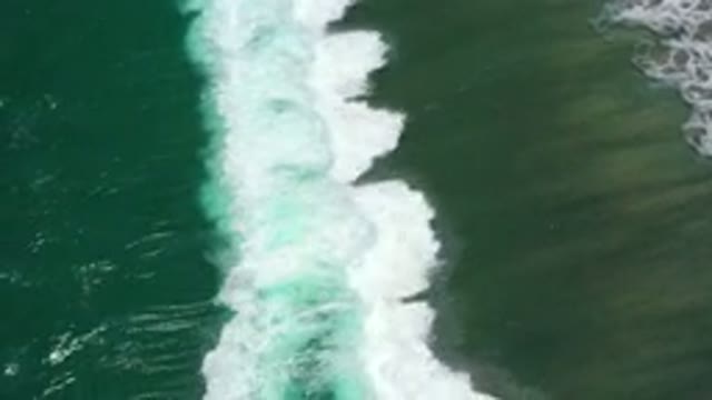 SAN JOSE DEL CABO MEXICO-2020: Peaceful Green Ocean Waves Water Lapp Surf Sand
