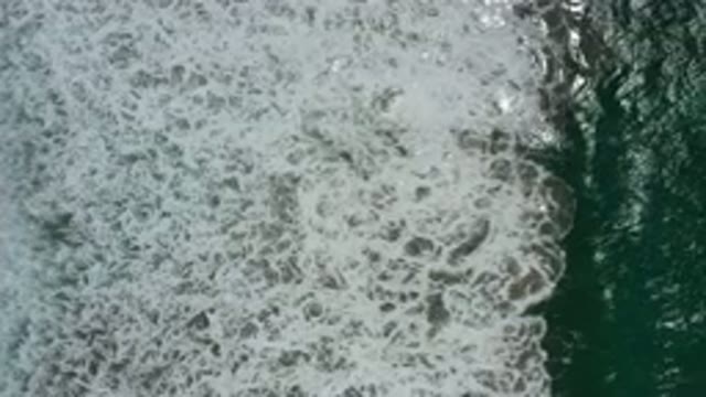 SAN JOSE DEL CABO MEXICO-2020: Dark Green Ocean Waves Slowly Crashing