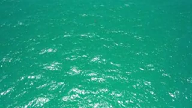 SAN JOSE DEL CABO MEXICO-2020: A Beautiful View Of Greenish Colored Water With Gentle Waves