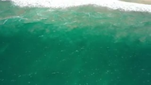 SAN JOSE DEL CABO MEXICO-2020: Video Panning Over A Deep Turquoise Body Of Water