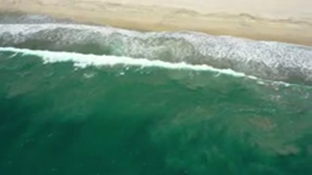 SAN JOSE DEL CABO MEXICO-2020: Tempered Waves Wash Onto Surrounding Shore