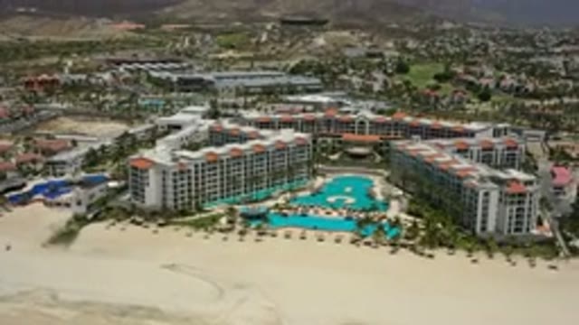 SAN JOSE DEL CABO MEXICO-2020: A View Of A Landscape With Many Buildings Pools