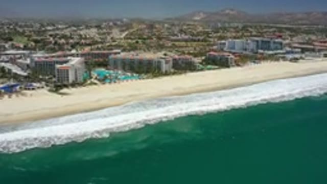 SAN JOSE DEL CABO MEXICO-2020: Waves Of Dark Green Sea Crashing At The Beach In
