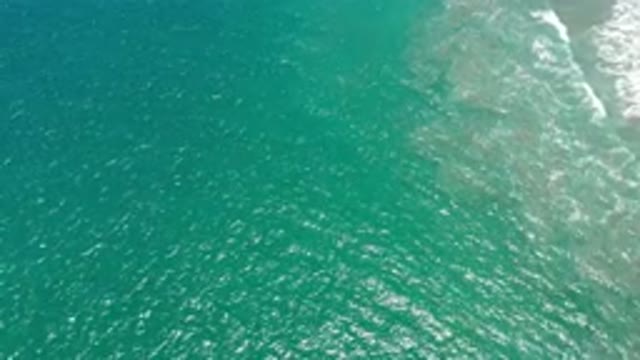 SAN JOSE DEL CABO MEXICO-2020: Ripples On A Sea-Green Ocean Where The Water Meets The Coast