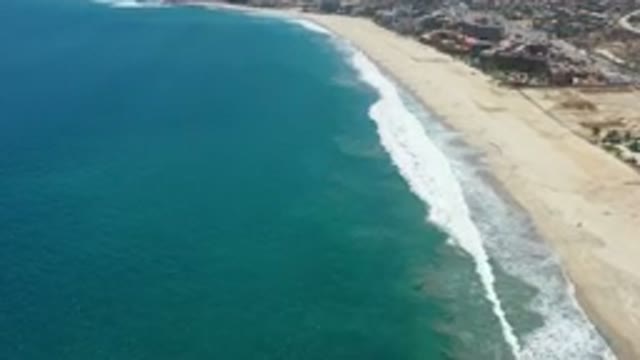 SAN JOSE DEL CABO MEXICO-2020: Top View Of Beach With Green Sea With Rough Waves