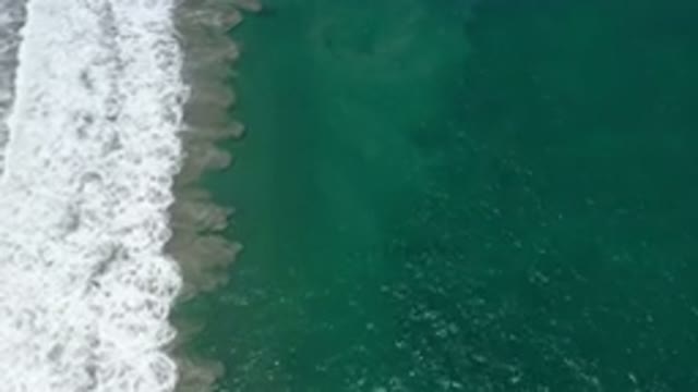 SAN JOSE DEL CABO MEXICO-2020: A Day At The Beach Watching The Suds Of The Surf