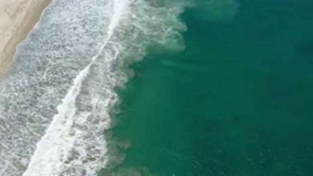 SAN JOSE DEL CABO MEXICO-2020: Top View Of A Beach With Deep Greenish Water With Gentle Waves