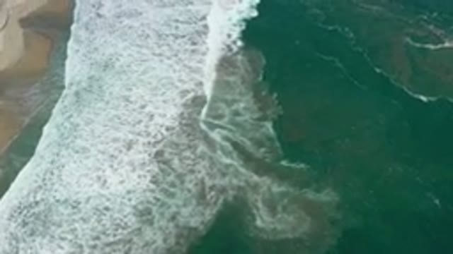 SAN JOSE DEL CABO MEXICO-2020: Aerial Video Of Teal Ocean Waters Along A Sandy Beach