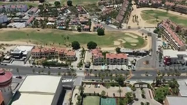 SAN JOSE DEL CABO MEXICO-2020: Buildings Trees House Apartment Large Grass Field