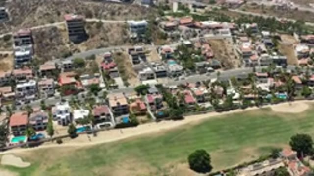 SAN JOSE DEL CABO MEXICO-2020: Aerial View Of Buildings Roads And Trees Below
