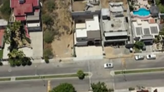 SAN JOSE DEL CABO MEXICO-2020: Buildings And Cars Along A Quiet Street