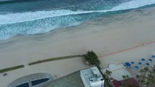 SAN JOSE DEL CABO MEXICO-2020: Drone In The Sky Captures Beach With Calm Waves