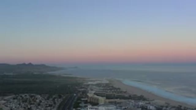SAN JOSE DEL CABO MEXICO-2020: View Of A Sunset Over The Sea Next To Houses