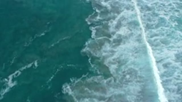 SAN JOSE DEL CABO MEXICO-2020: A Top View Of White Line Bubble Wave In The Sea