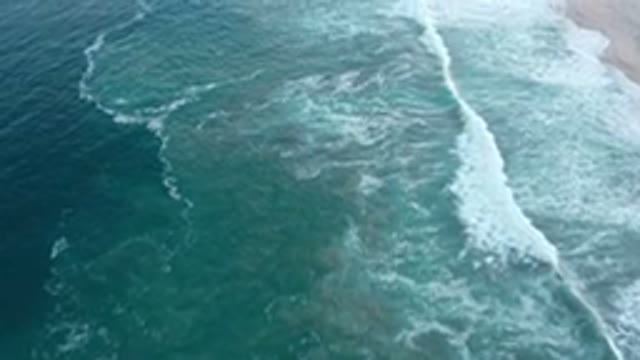 SAN JOSE DEL CABO MEXICO-2020: Soft Waves Crashing on Empty Beach