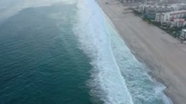 SAN JOSE DEL CABO MEXICO-2020: Aerial View Of Waves Breaking Along A Short Near Shore