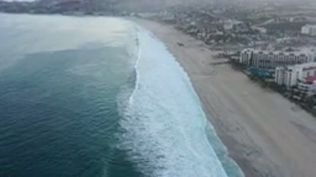 SAN JOSE DEL CABO MEXICO-2020: A View Of The Ocean Wave Shore Beach And Resort