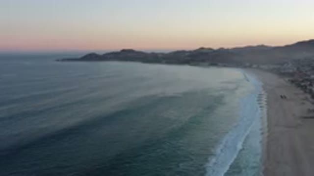 SAN JOSE DEL CABO MEXICO-2020: Drone In The Sky Filming A Beach And Its Sunset