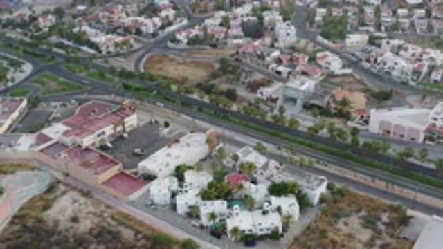 SAN JOSE DEL CABO MEXICO-2020: Aerial View Highway Town Cars Trees House