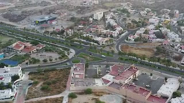 SAN JOSE DEL CABO MEXICO-2020: Aircraft Flying Over City Near Remote Desert Area