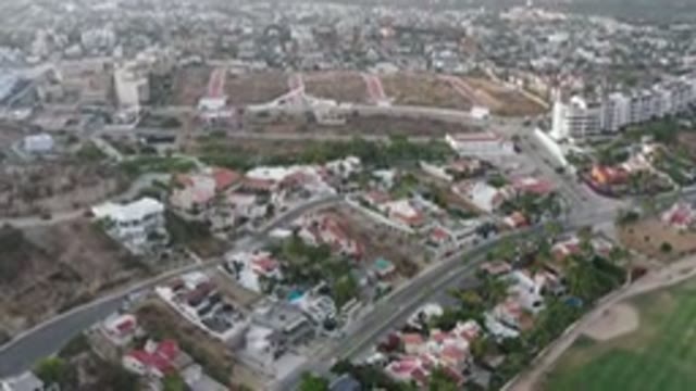 SAN JOSE DEL CABO MEXICO-2020: Drone Footage Of A Residential Area With A Green