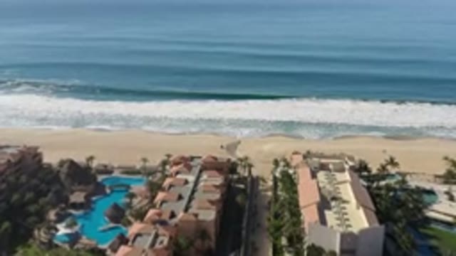 LOS CABOS MEXICO-2020: Top Side View Of A Deep Blue Sea Beach And Hotels With