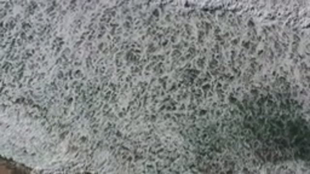 LOS CABOS MEXICO-2020: Waves Calmly Crashing At The Beach Captured By Drone In