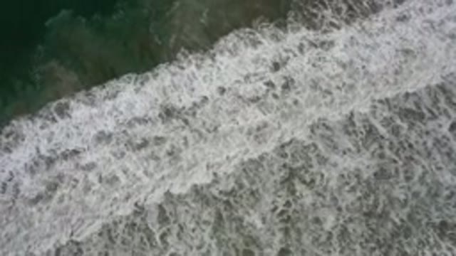 LOS CABOS MEXICO-2020: Waves Crashing At The Beach And The Sunshine Reflecting