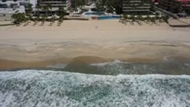 LOS CABOS MEXICO-2020: Top View Of A White Bubbled Wave Towards A Wide Beach