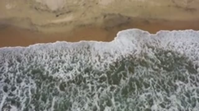 LOS CABOS MEXICO-2020: A Large And Wide White Bubbled Waves On A Beach Near To A