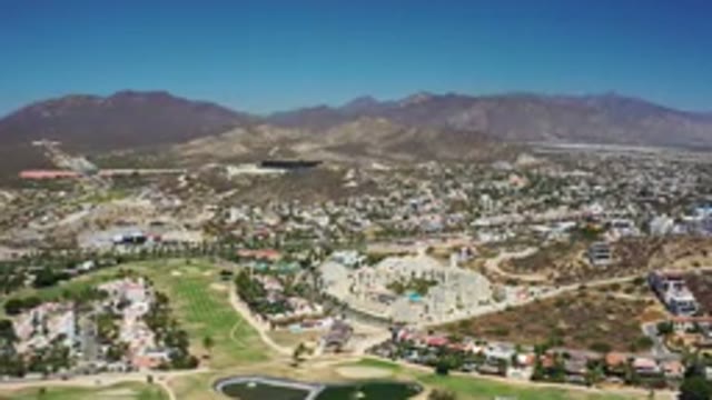 LOS CABOS MEXICO-2020: Drone Footage Of A Mexican Town With Large Mountains In