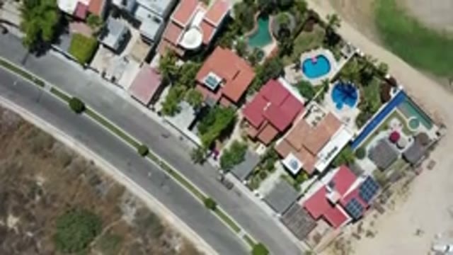LOS CABOS MEXICO-2020: Aerial View of Houses, Pools, and Trees