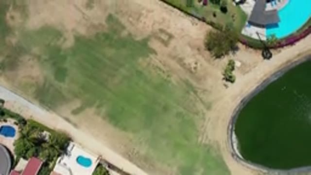 LOS CABOS MEXICO-2020: Aerial View Of Green Field And Hotel Resort With Circular Buildings