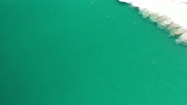 LOS CABOS MEXICO-2020: Beautiful Sky View Of A Large Green And Blue Ocean