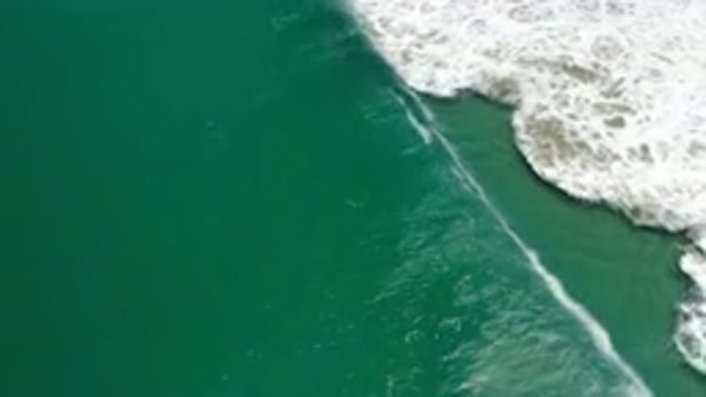 LOS CABOS MEXICO-2020: The Blue Green Waves Crash Into The Ocean And Creates