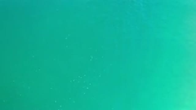 LOS CABOS MEXICO-2020: In A Sea In Depth Water Waving Slowly With Blue Color