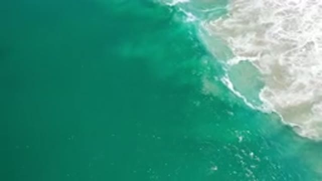 LOS CABOS MEXICO-2020: Deep Shiny Blue Sea With Waves Crashing On The Beach